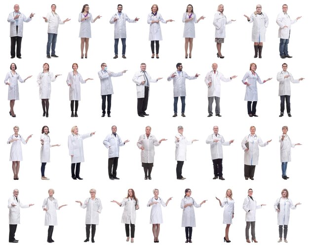 Group of doctors in full length isolated on white