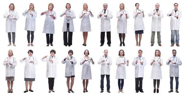 Group of doctors holding jar isolated on white