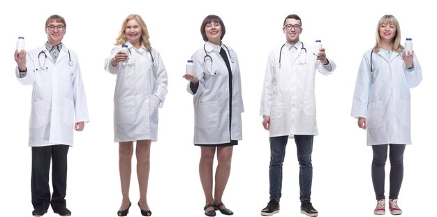 Group of doctors holding jar isolated on white