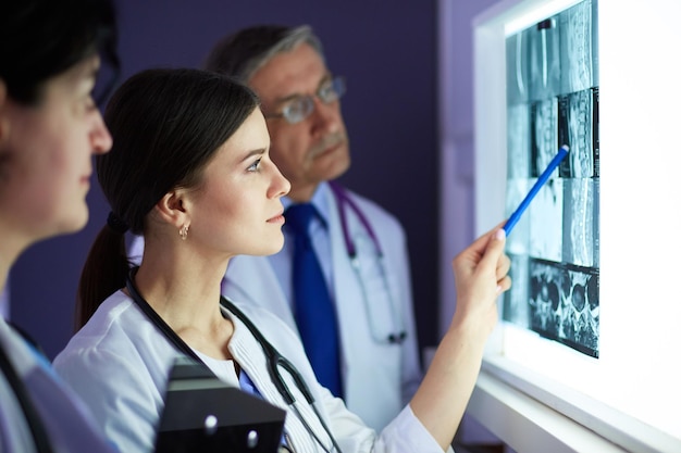 Group of doctors in a hospital Xray diagnostics