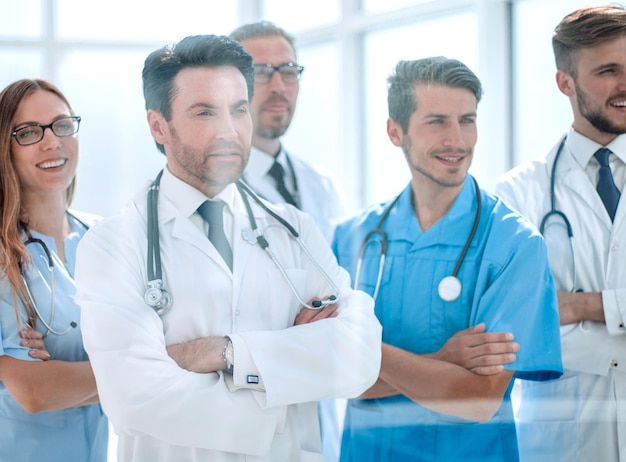 Group of doctors looking at the desktop in the meeting room