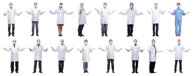 Photo group of doctors in mask isolated on white