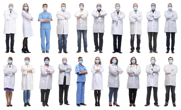 Photo group of doctors in mask isolated on white