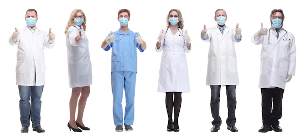 Group of doctors in mask isolated on white