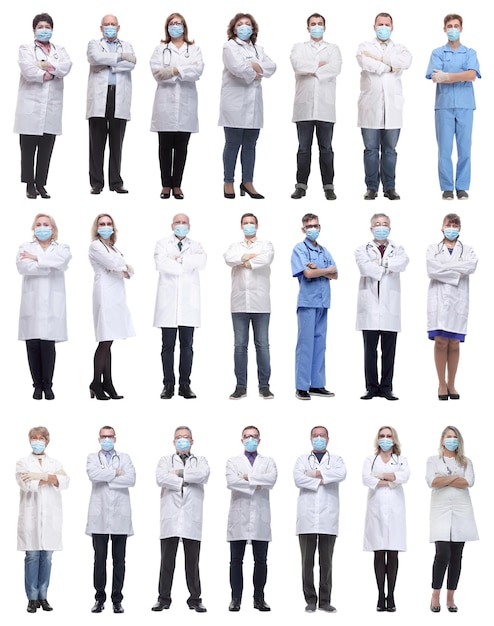 Photo group of doctors in mask isolated on white