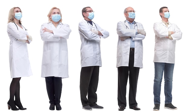 Group of doctors in mask isolated on white