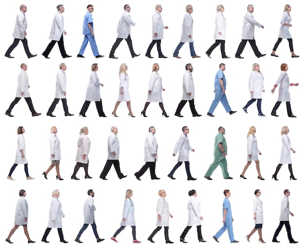 group of doctors in motion isolated on white