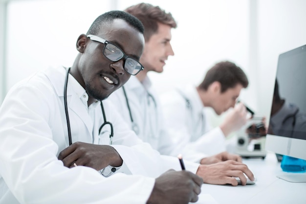 Group of doctors sitting in the laboratory