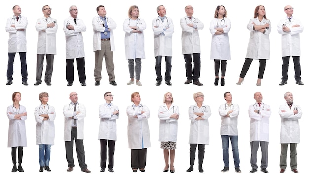 Group of doctors standing in full length isolated on white