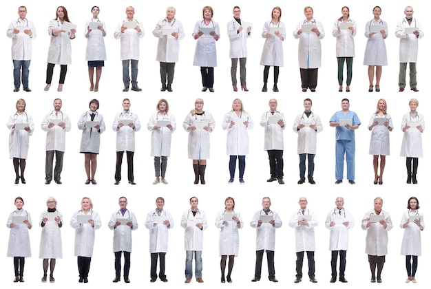 Group of doctors with clipboard isolated on white