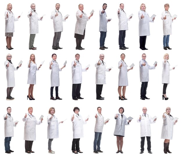 Group of doctors with clipboard isolated on white