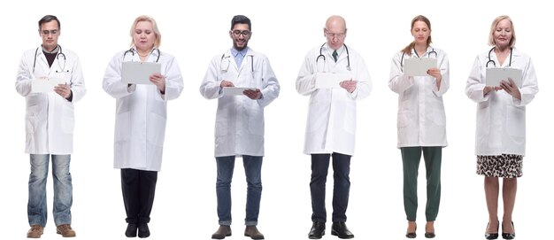 Group of doctors with clipboard isolated on white