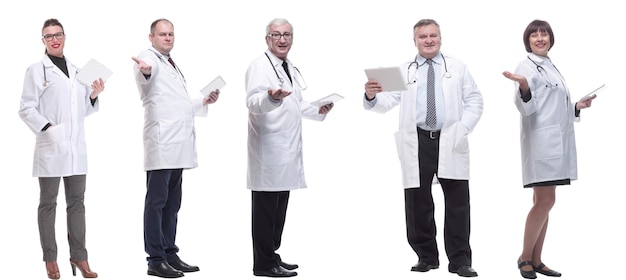 Group of doctors with clipboard isolated on white