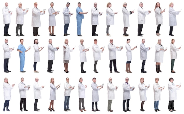 Group of doctors with clipboard isolated on white