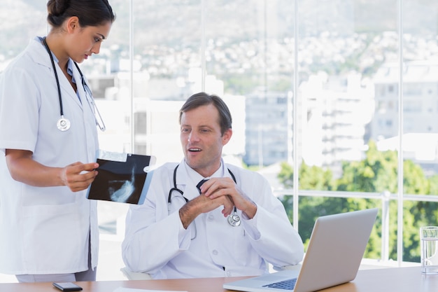 Group of doctors working on a x ray