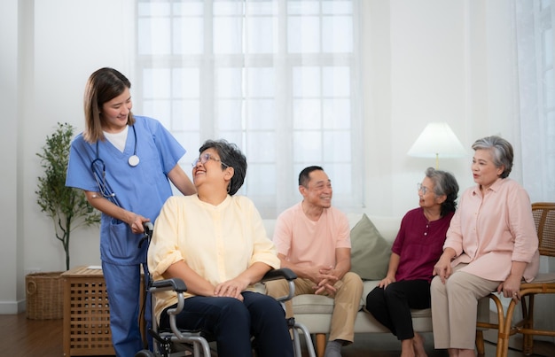 Group of elderly and Asian senior female patient and nurse in nursing home elderly people