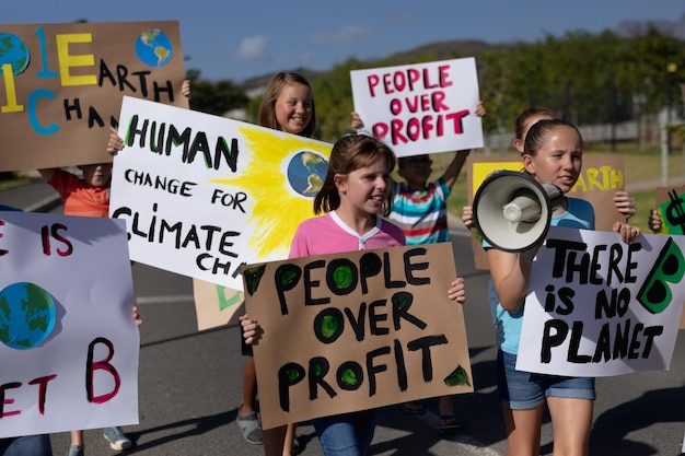 Group of elementary school pupils walking on a protest march