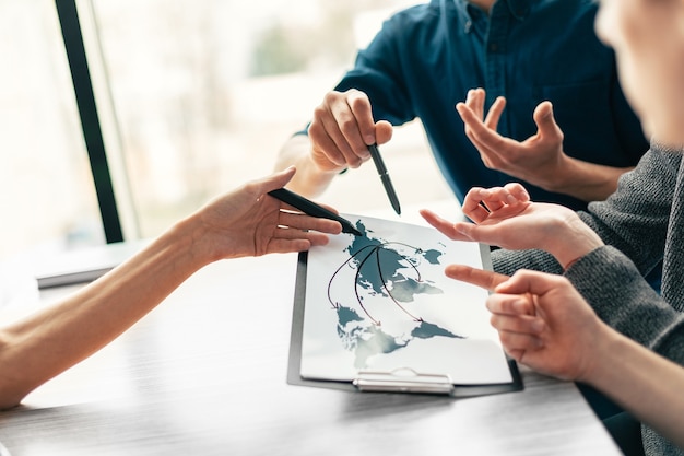 a group of employees discussing ideas for a new startup