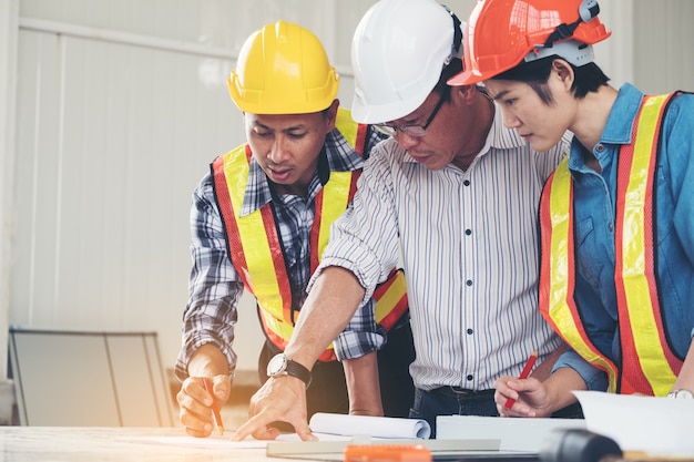 Group engineers and architects are discussing the construction