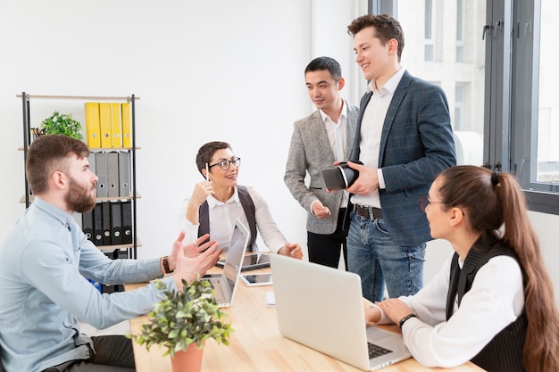 Group of entrepreneurs working at the office