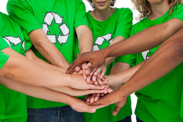 Group of environmental activists putting hands together