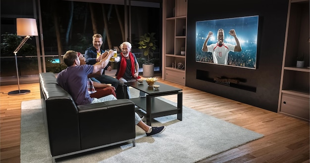 Group of fans are watching a soccer moment on the TV and celebrating a goal sitting on the couch in the living room The living room is made in 3D