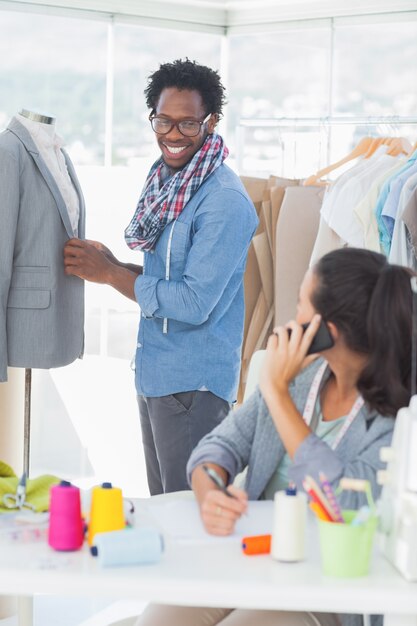 Group of fashion designers working together