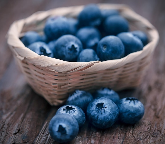 Group of fresh blueberries on natural surface