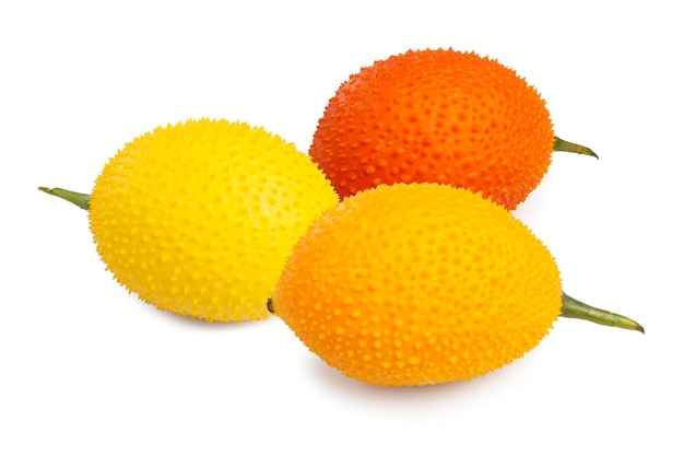 Group of Fresh Gac Fruit or Baby Jackfruit bright yellow fruit in round shape with thorns