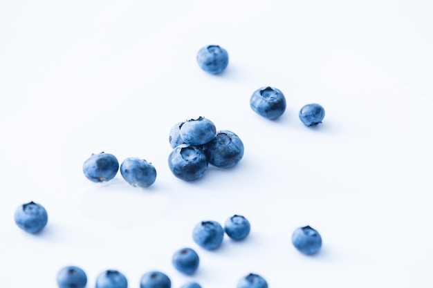 Group of fresh juisy blueberries isolated on white background