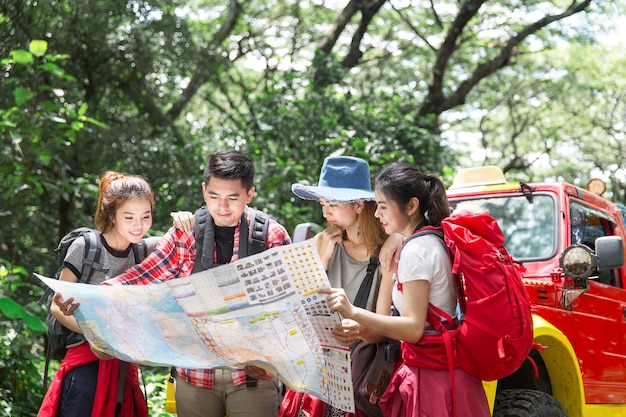 Premium Photo | Group of friends asian camp forest adventure travel remote  relax concept, mountain view.