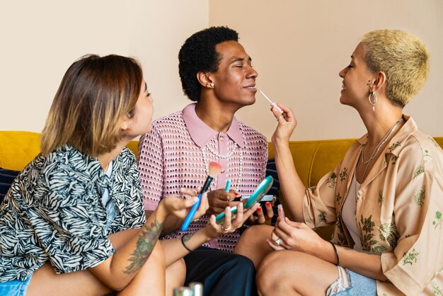 Group of friends bonding at home LGBTQ and diversity concepts