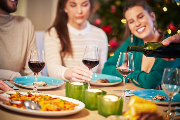 group of friends celebrating Christmas at home