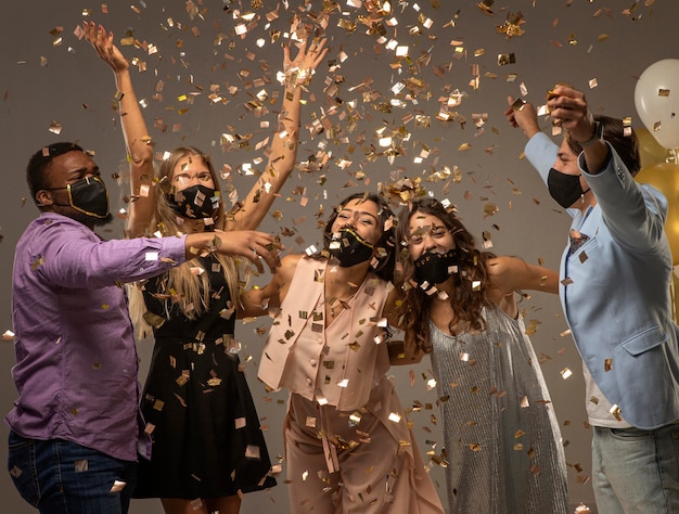 Group of friends celebrating new year concept