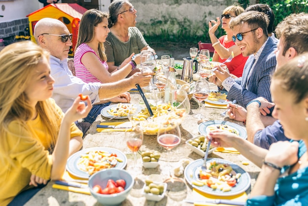 Group of friends eating outdoor