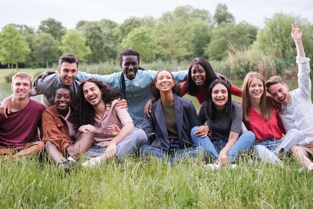 Group of friends from different cultural backgrounds having a fun time outdoors