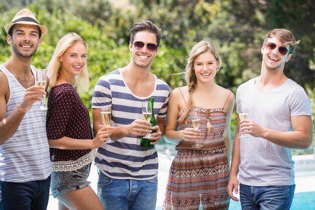 Group of friends having champagne