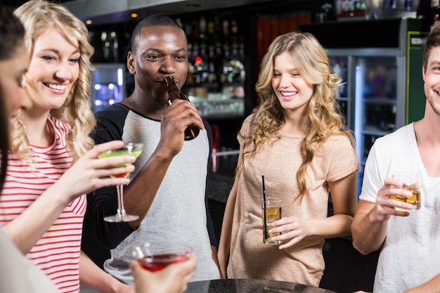 Group of friends having a drink 