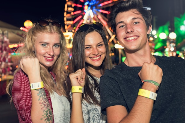 A group of friends is enjoying the amusement park