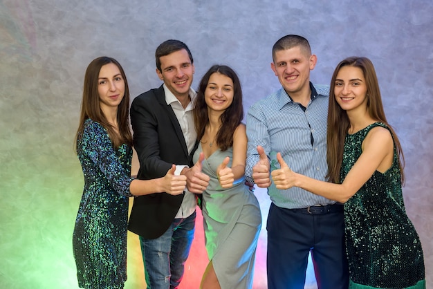 Group of friends posing at celebration of New Year