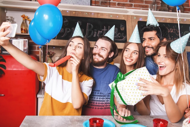 Group of friends taking selfie whilst