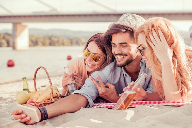 Group of friends taking selfie