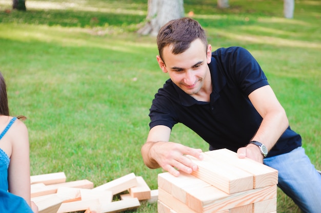 Group game of physical skill with big blocks