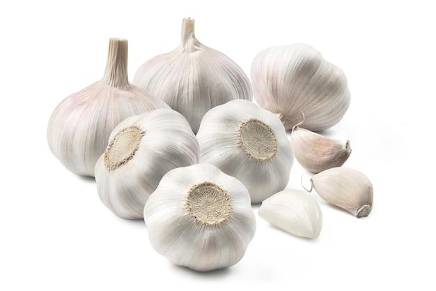 Group of garlic and garlic hooves on a white