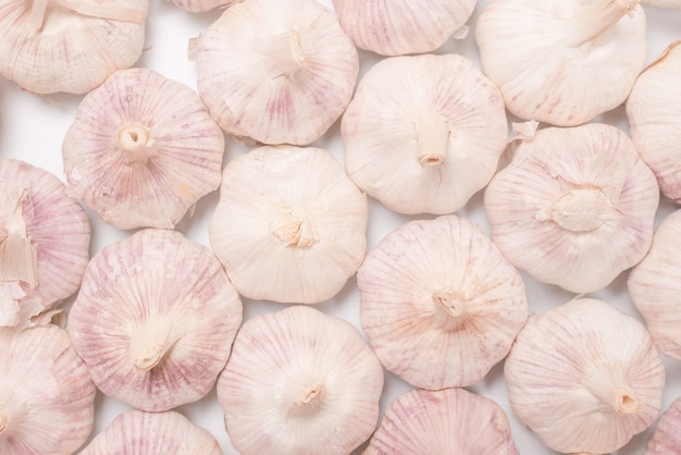 Group of garlic isolated on a white surface