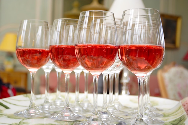 Group of glasses with rose sparkling wine