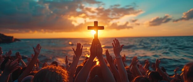 The group of hands kneeling and holding the cross of Christ at sunset are part of a Christian Christianity Religion copy space background