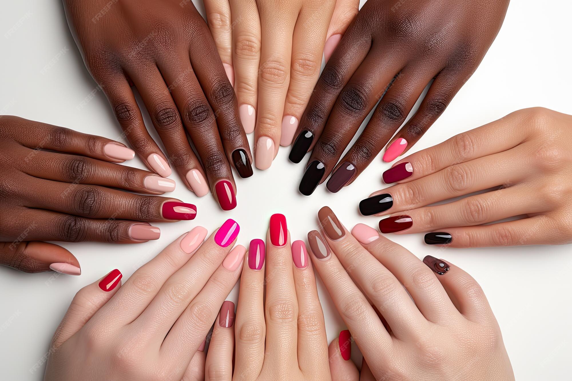 A group of hands with different colored nails Artistic shots of hands