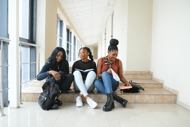 Group of happy african college friends