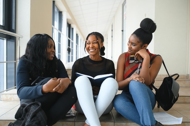 Group of happy african college friends